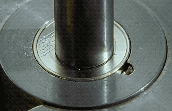 双色硬币的内芯和外环 是怎么嵌套在一起永不分离的_wishdown.com 双色硬币的内芯和外环 是怎么嵌套在一起永不分离的_wishdown.com