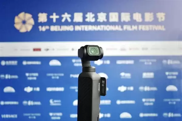 DJI��ЯOsmo Pocket 4�����ʮ���챱�����ʵ�Ӱ�ڣ��ԿƼ������Ӱ֮��